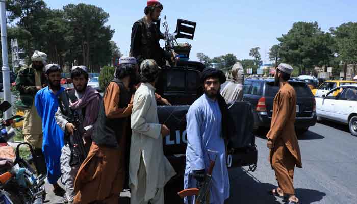 Taliban forces patrol a street in Herat, Afghanistan, August 14, 2021. &mdash; Reuters/Stringer