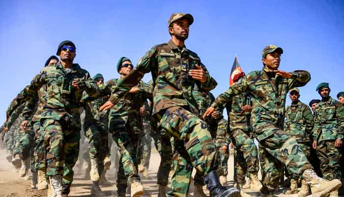 Afghan National Army soldiers march during a ceremony at a military base in the Guzara district of Herat province, October 11, 2020. Photo: AFP