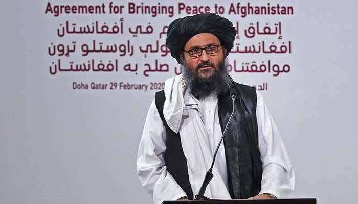 Mullah Abdul Ghani Baradar addressing an event in Doha, Qatar, on February 29, 2020, to oversee the signing of a landmark peace deal between America and the Taliban. Photo: AFP