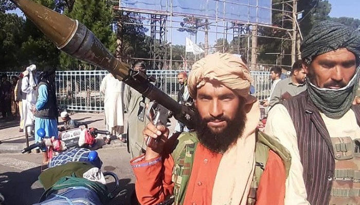 Taliban figher holds up a rocket launcher. Photo: AFP
