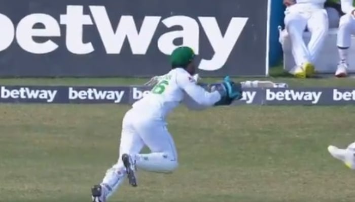 Pakistani wicketkeeper Mohammad Rizwan leaps towards fine leg to take a catch. Photo: Twitter video screengrab