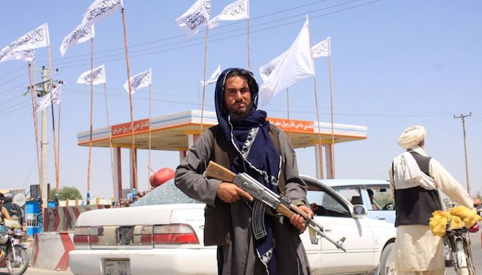 A Taliban fighter looks on as he stands at the city of Ghazni, Afghanistan August 14, 2021. Photo: Reuters