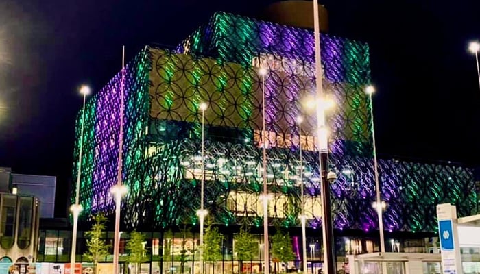 The Library of Birmingham lights up green and white on the occasion of Pakistan’s 75th Independence Day, on August 14, 2021, in Birmingham, UK. — Photo by authors