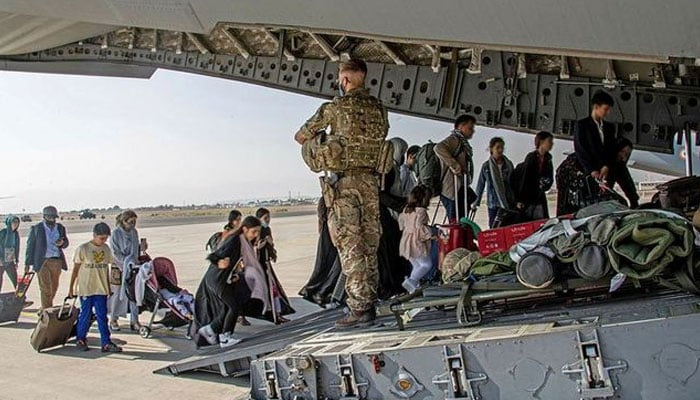 Up to 20,000 Afghans to be resettled in UK long term