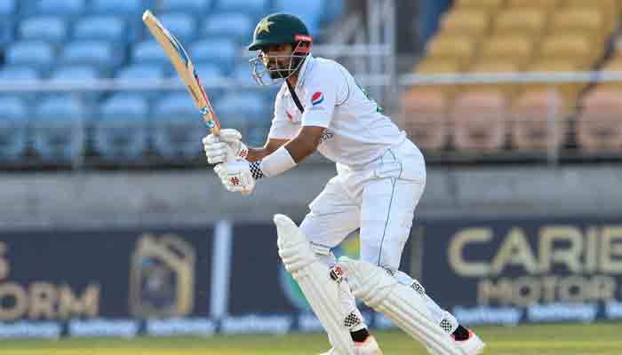 Babar Azam of Pakistan hits 4 during day 3 of the 1st Test between West Indies and Pakistan at Sabina Park, Kingston, Jamaica, on August 14, 2021.-AFP