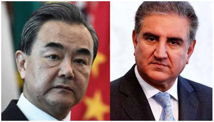 Chinese FM Wang Yi gives a phone call to FM Shah Mahmood Qureshi. Photo APP