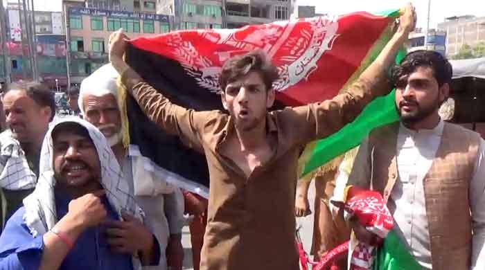 Three killed as Afghan protests test Taliban's promise of peaceful rule