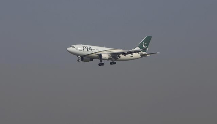 A Pakistan International Airlines (PIA) passenger plane arrives at the Benazir International airport in Islamabad, Pakistan, December 2, 2015. — Reuters/File