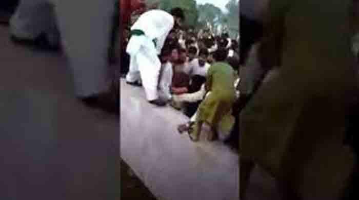 Woman being groped by several men at Minar-e-Pakistan in Lahore, on August 14, 2021. — Screengrab from a Twitter video