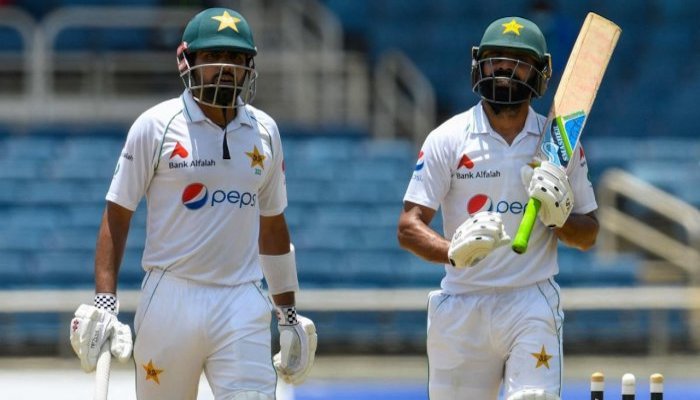 Babar Azam (left) and Fawad Alam of Pakistan walk off the field for lunch break during day 1 of the second Test between West Indies and Pakistan at Sabina Park, Kingston, Jamaica. Photo: AFP