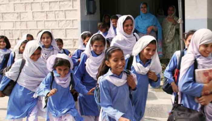 Schoolgirls rush towards their classes. Photo: File