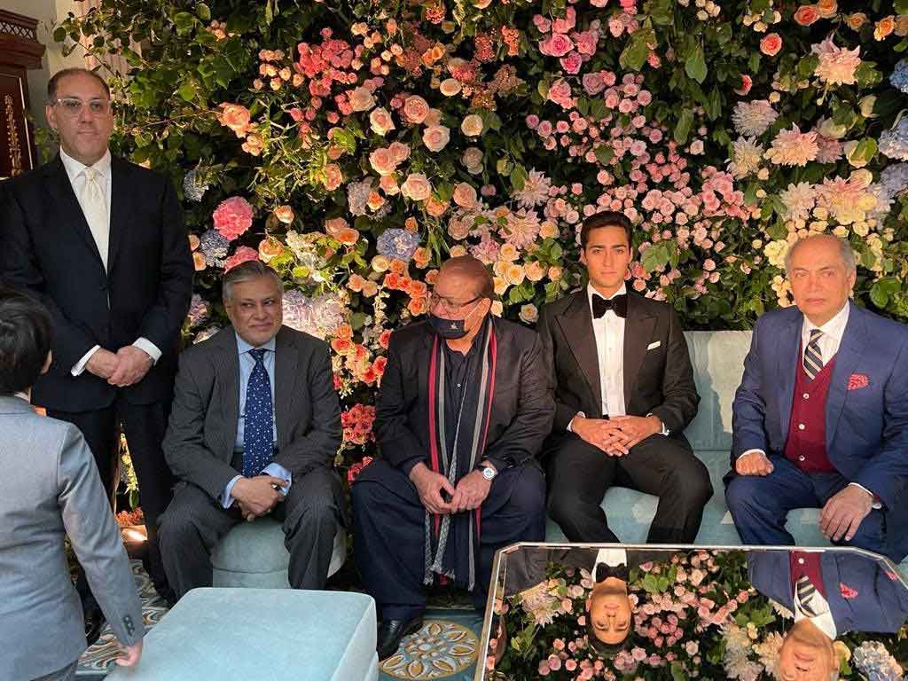The groom-to-be Junaid Safdar (2nd R) and his grandfather Nawaz Sharif (C) at the London venue. Hussain Nawaz is seen standing (L) with former finance minister Ishaq Dar (2nd L) also in attendance,  on August 22, 2021. — Photo courtesy PML-N