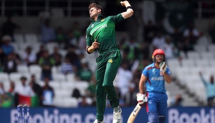 Shaheen Afridi jumps into the air after dismissing an Afghanistan batsman. Photo: AFP