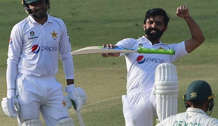 Pakistani batsman Fawad Alam celebrates after scoring a Test century against South Africa. Photo: AFP