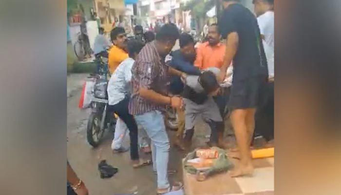 The mob beating a Muslim man in IndiasMadhya Pradesh, on August 22, 2021. — NDTV