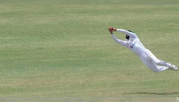 Pakistani fielder Fawad Alam leaps to the right to take a splendid catch. Photo: Twitter