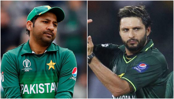 Former Pakistan skippers Sarfaraz Ahmed (L) and Shahid Afridi, who is seen asking for a review by the third umpire during a match in Colombo, March 3, 2011. — Reuters/File