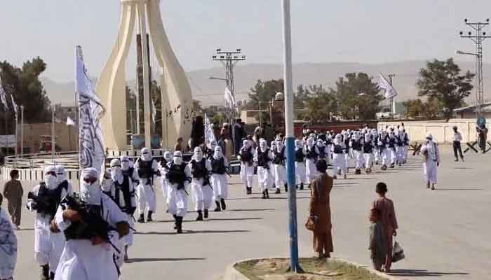 Taliban fighters march in uniforms on the street in Qalat, Zabul Province, Afghanistan, in this still image taken from social media video uploaded August 19, 2021. — Reuters/File