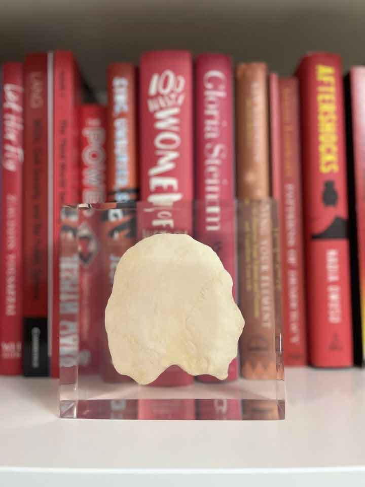 Malalas skull bone on her bookshelf. — Photo courtesy Podium/Malala