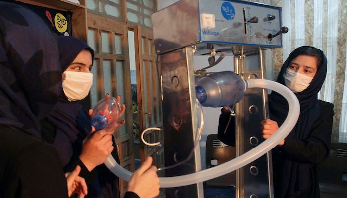 Members of an Afghan all-female robotics team work on an open-source and low-cost ventilator, during the coronavirus disease (COVID-19) outbreak in Herat Province, Afghanistan April 15, 2020. Photo: Reuters