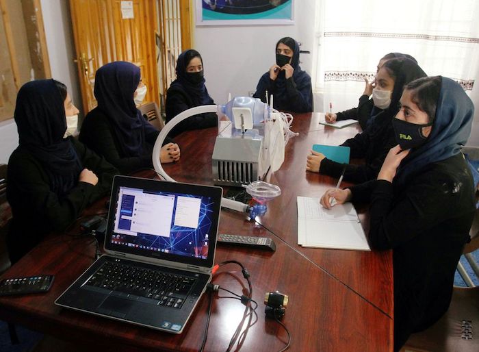 Members of an Afghan all-female robotics team work on an open-source and low-cost ventilator, during the coronavirus disease (COVID-19) outbreak in Herat Province, Afghanistan April 15, 2020. Photo: Reuters