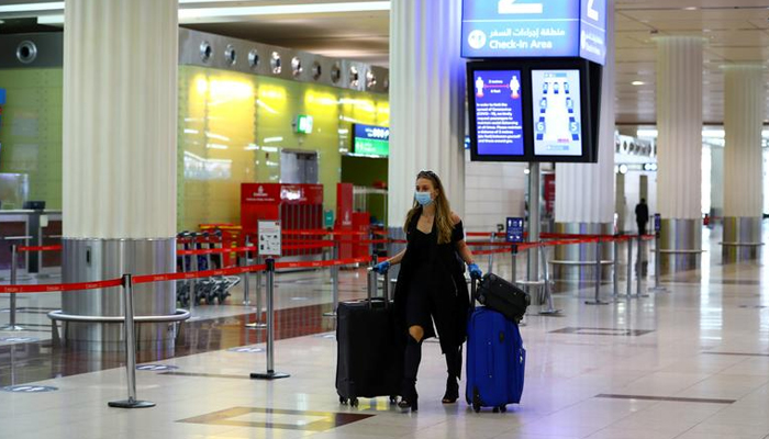 A passenger walks at Dubai International Airport, as Emirates airline resumed limited outbound passenger flights amid outbreak of the coronavirus disease (COVID-19) in Dubai, UAE April 27, 2020. — Reuters/File