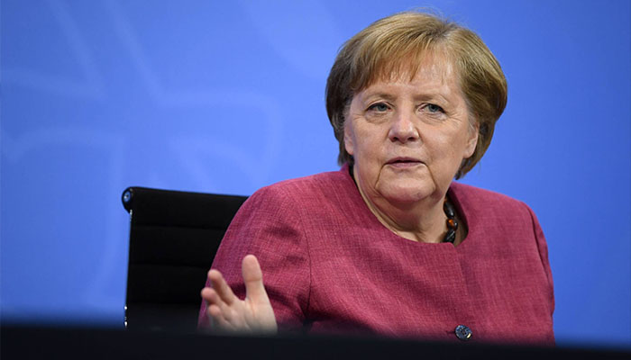 Angela Merkel supporters say she provided steady, pragmatic leadership through countless global crises — AFP