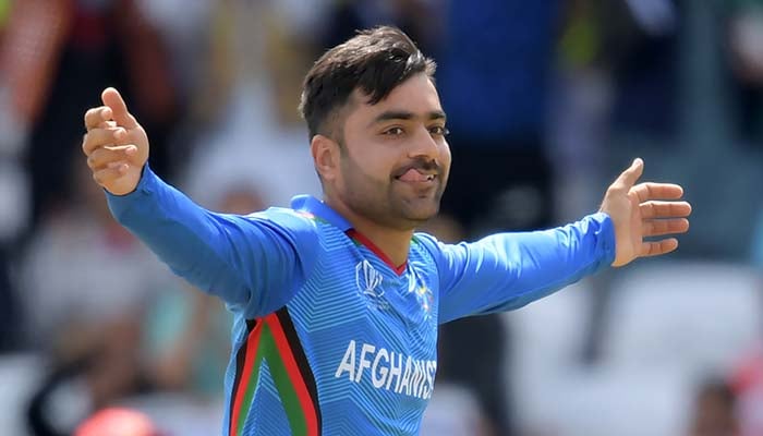 Afghan cricketer Rashid Khan celebrates after taking a wicket — File
