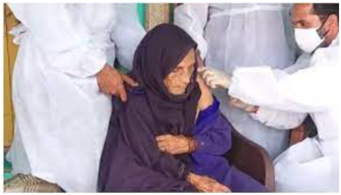 Watch: A 120-year-old lady getting second COVID-19 jab in India-occupied Kashmir - Vimarsana News