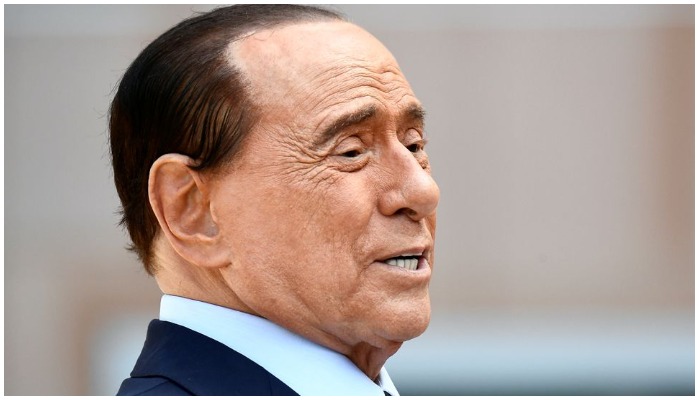 Former Italian Prime Minister Silvio Berlusconi speaks to the media as he leaves Milans San Raffaele hospital, where he was being treated after testing positive for the coronavirus disease. Photo Reuters