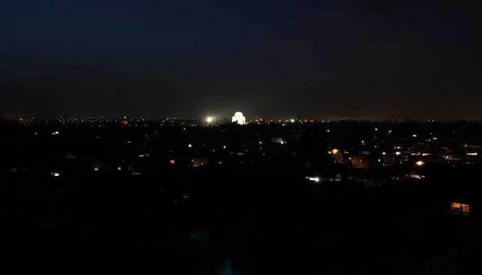 Karachi surrounded by darkness with only the Quaid;s mausoleum glowing. Photo: File