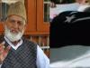 Kashmiri leader Syed Ali Geelani's body wrapped in Pakistan's flag before burial