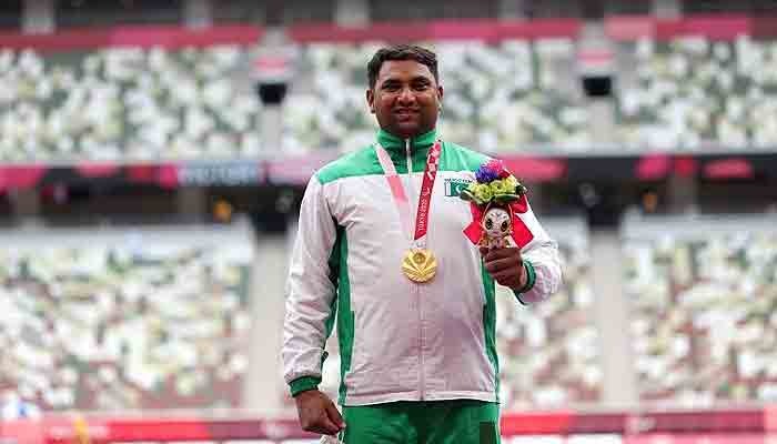 Pakistans Haider Ali smiles after winning the gold medal. Photo: PTV