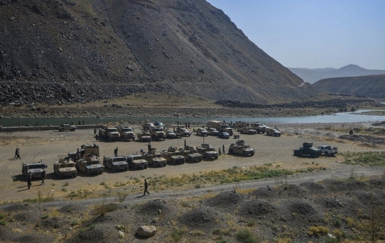 Armed Humvee vehicles from the Afghan Security Forces are pictured along a path in Panjshir province in Afghanistan on August 15, 2021 [Ahmad Sahel Arman/AFP]
