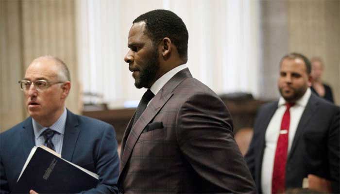 R. Kelly accuser says she reached $200,000 settlement after herpes diagnosis