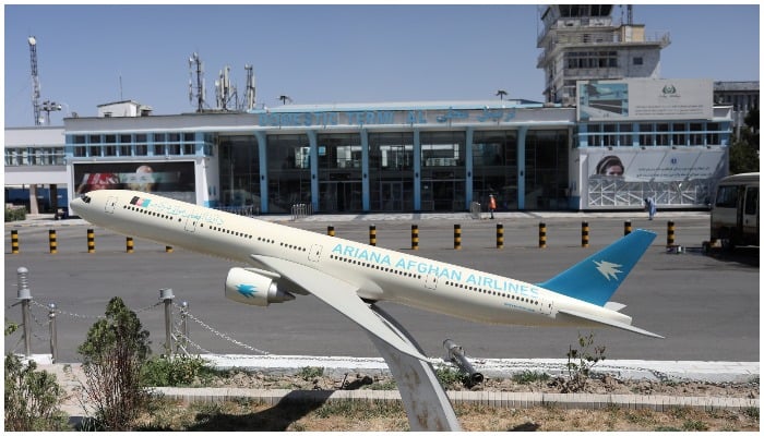 A model of an Ariana Afghan Airlines airplane is seen in front of the international airport in Kabul, Afghanistan, on September 5, 2021. WANA (West Asia News Agency) via REUTERS.