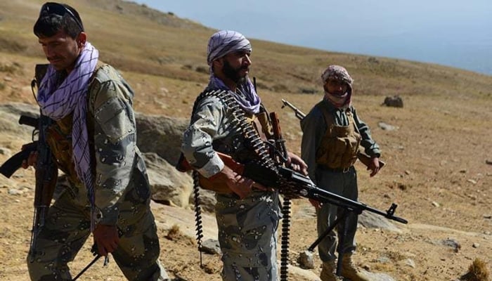 Anti-Taliban forces patrol on a hilltop in Darband area in Anaba district, Panjshir province. Photo: AFP