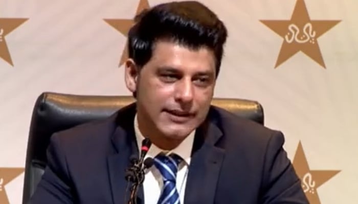 Chief Selector Muhammad Waseem smiles as he answers a journalists question. Photo: PCB Twitter video screengrab