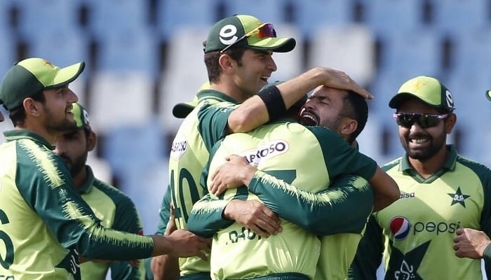 Pakistan cricket team celebrate after taking a wicket. Photo: AFP