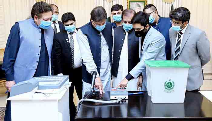 Prime Minister Imran Khan at the demonstration of Electronic Voting Machine developed by Ministry of Science and Technology. -APP