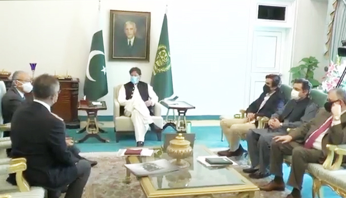 Prime Minister Imran Khan in a meeting with the delegation of Toyota Indus Motors Company. —Twitter/PakPMO