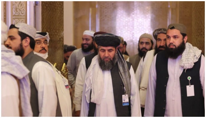 Members of the Taliban delegation are seen at the conclusion of peace talks between the Afghan government and the Taliban, in Doha, Qatar, on July 18, 2021. Photo: AFP.