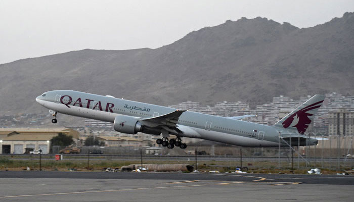 The first commercial flight leaves Afghanistan for Qatar. AFP