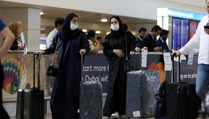 Travellers wear masks as they arrive at the Dubai International Airport, after the UAEs Ministry of Health and Community Prevention confirmed the countrys first case of coronavirus, in Dubai, United Arab Emirates January 29, 2020. — Reuters/File