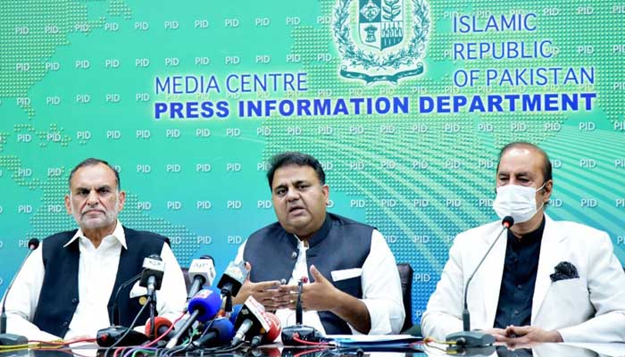 Railways Minister Azam Khan Swati (L) Information and Broadcasting Minister Fawad Chaudhry (C) and Adviser to the Prime Minister for Parliamentary Affairs Babar Awan hold a press conference in Islamabad on Friday, September 10, 2021. — PID