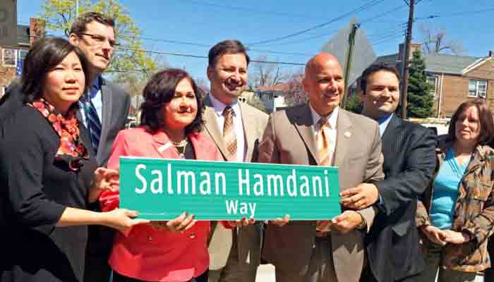 Talat Hamdani (centre) and New York City officials at an event to commemorate naming of Salman Hamdani Way. File photo