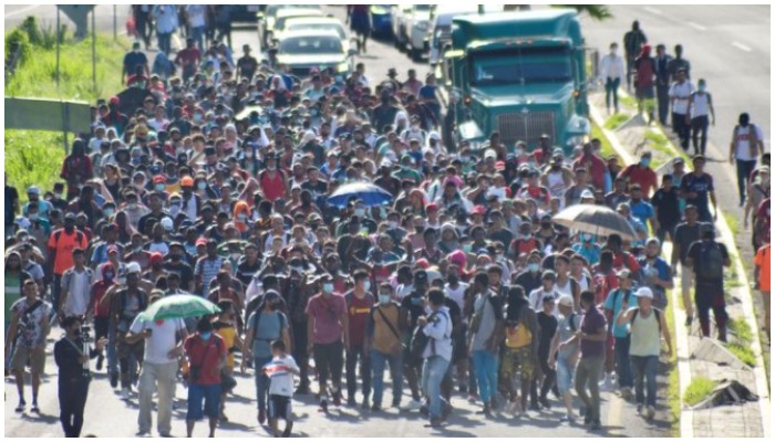 Migrants and asylum seekers from Central America and the Caribbean walk in a caravan heading to the U.S., in Tapachula, Chiapas state, Mexico September 4, 2021. REUTERS/Jacob Garcia