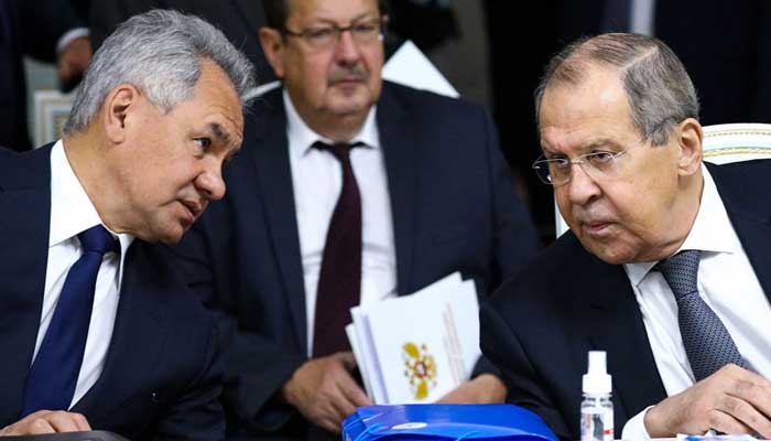 Russian Defense Minister Sergei Shoigu (L) and Foreign Minister Sergei Lavrov attend a joint meeting of foreign and defense ministers, and secretaries of security councils of CSTO members. — Russian Foreign Ministry/TASS