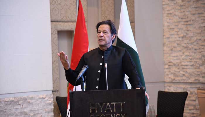 Prime Minister Imran Khan gestures as he addresses an event for Tajikistan and Pakistans business communities. — Photo courtesy Twitter/Prime Ministers Office