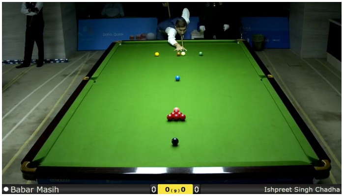 Pakistani snooker player Babar Masih trying to pocket a ball at his first match of IBSF 6 Reds World Cup.